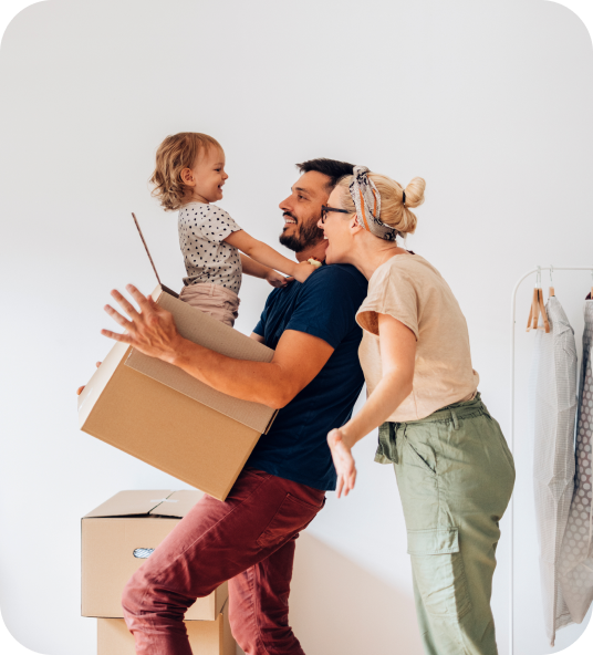 Young family with child moving boxes, illustrating Homage AI's property trade-in streamelined process.